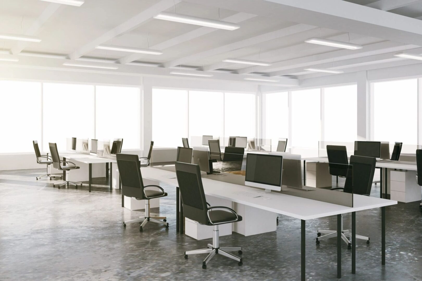 Open space loft office with furniture and big windows